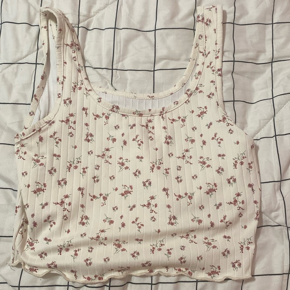 This flower shirt is from SHEIN it is a medium